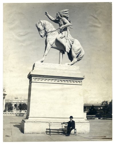 Statue of an American Indian Seated on a Horse on Top of a Large Pedestal by Unknown